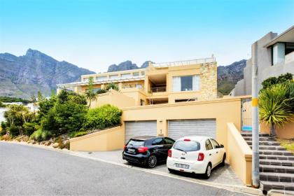 Backup-Powered Camps Bay Beach Condo - image 2