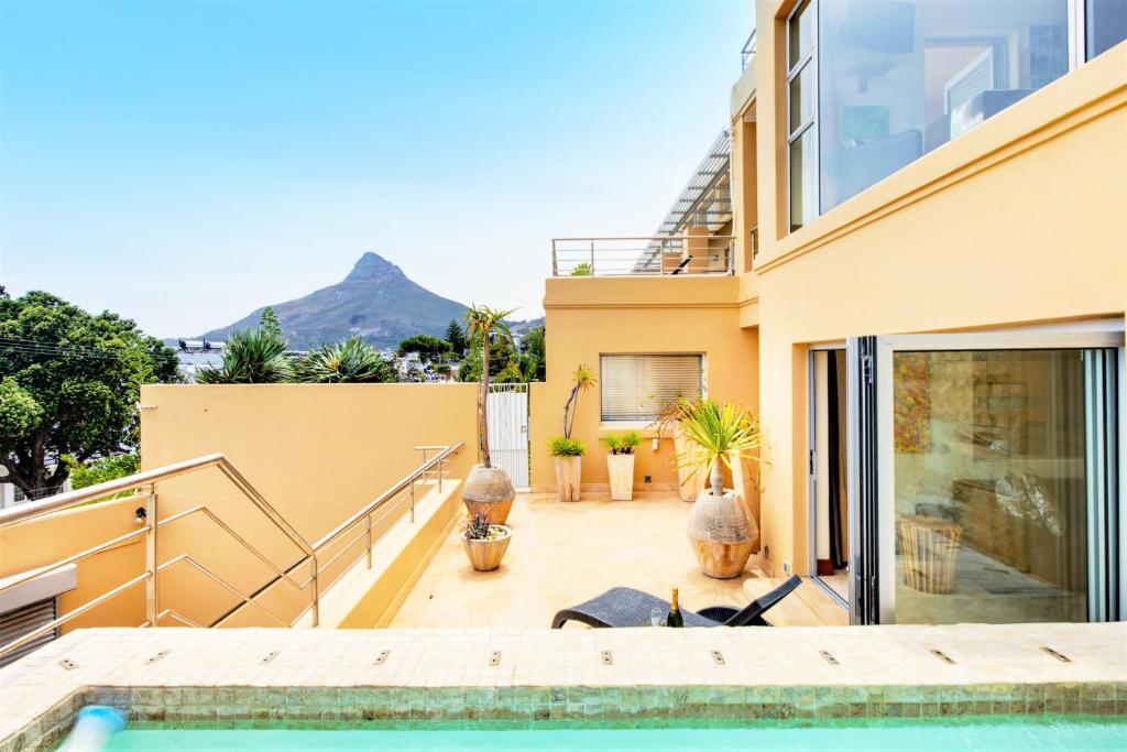 Backup-Powered Camps Bay Beach Condo - image 3